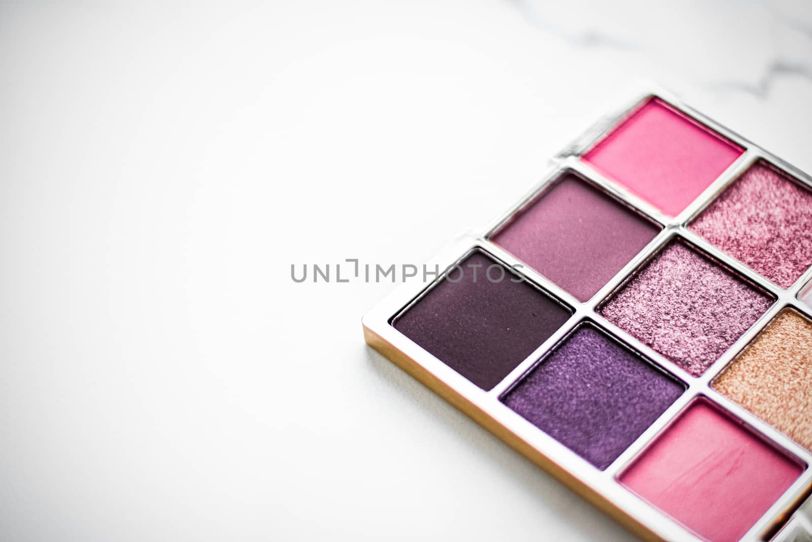 Eye shadow palette on marble background, make-up and cosmetics p by Anneleven