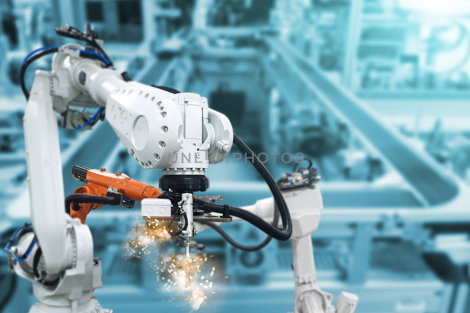 Robotic arms, industrial robots, factory automation machines by sompongtom
