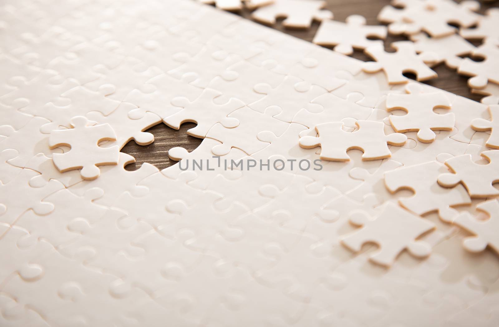 White jigsaw puzzle with blackground