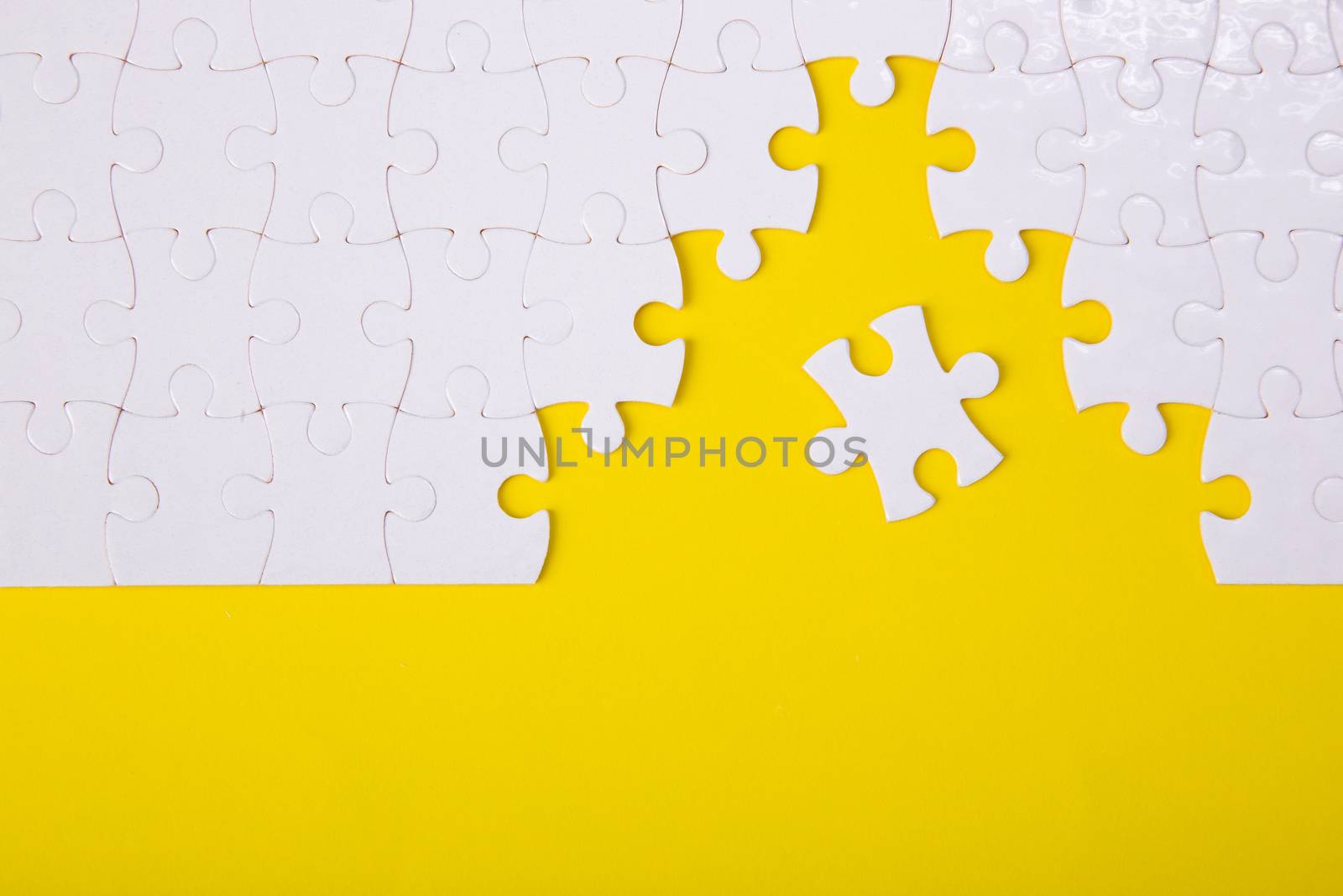 White jigsaw puzzle pattern background. jigsaw puzzle