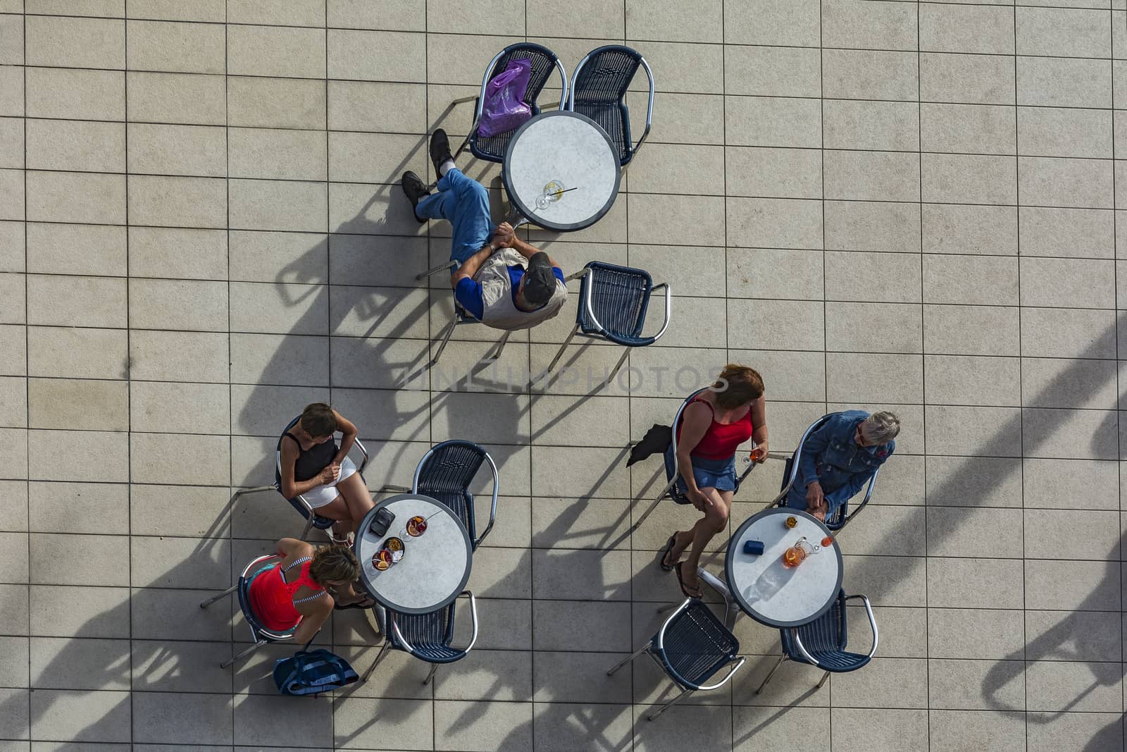 Spain, Blanc - September 17, 2017: a Group of people sitting at the tables of summer cafes, top view
