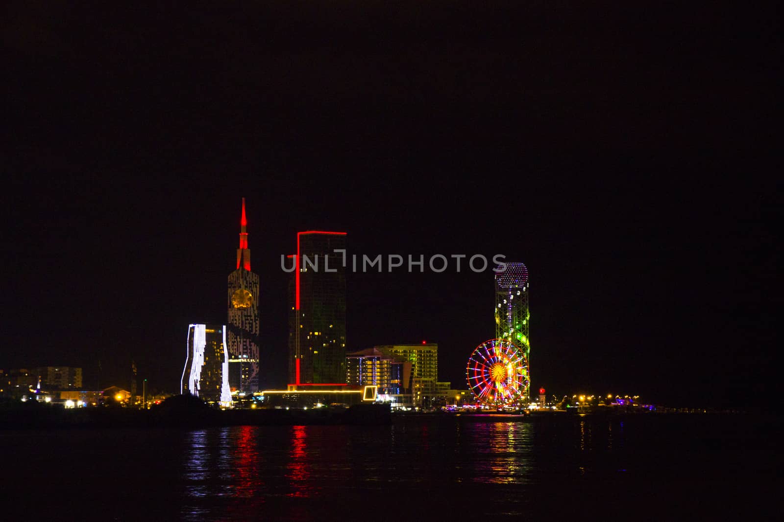 Batumi at night city view, skyscrapers and towers. City view at night. by Taidundua