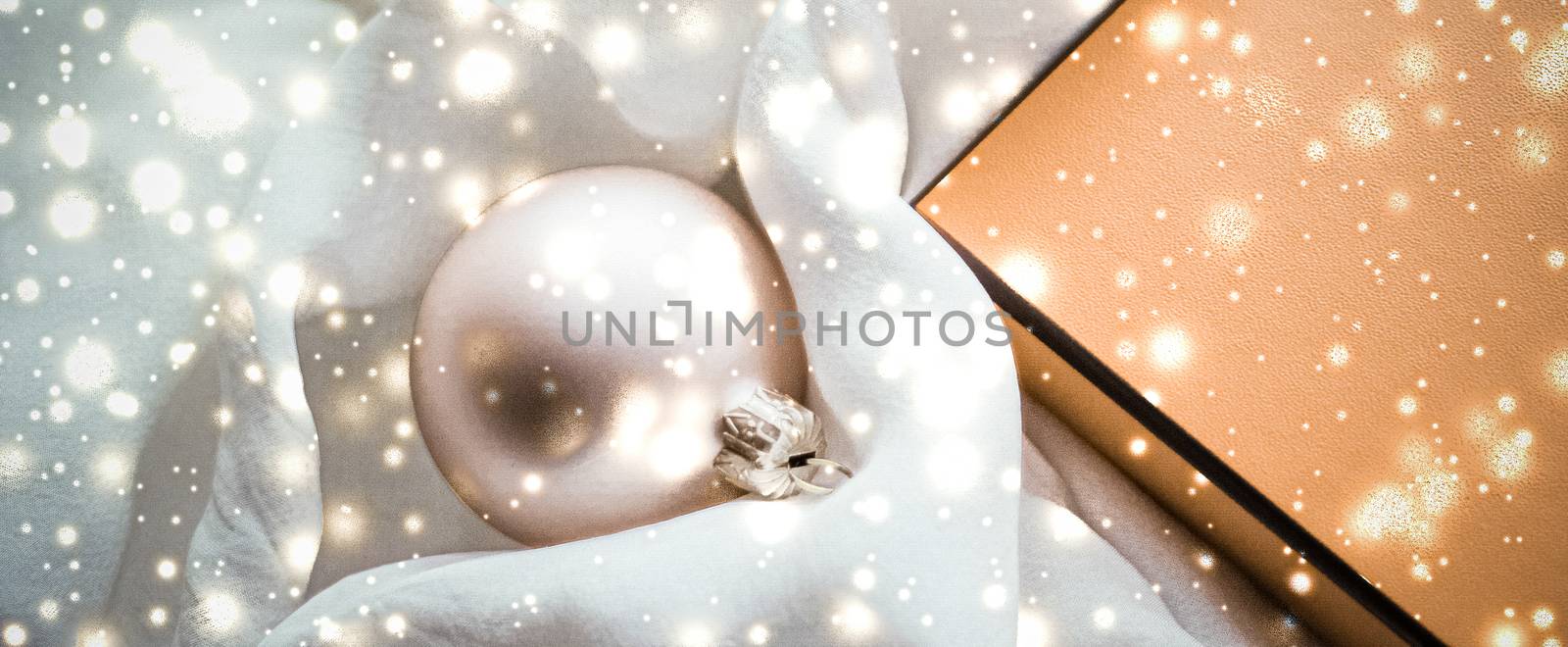 Holidays branding, glamour and decoration concept - Christmas magic holiday background, festive baubles, yellow vintage gift box and golden glitter as winter season present for luxury brand design