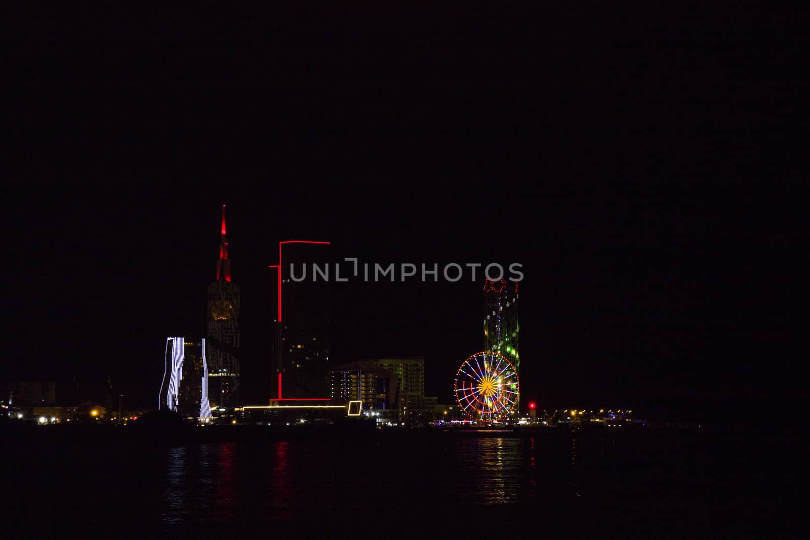 Batumi at night city view, skyscrapers and towers. City view at night. by Taidundua