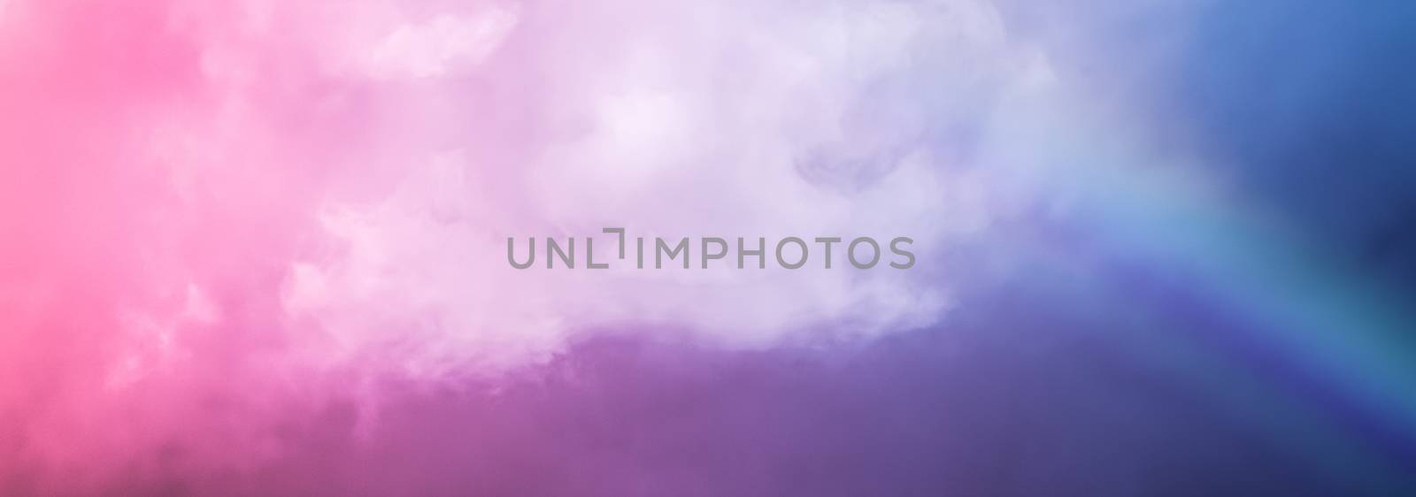 Rainbow in fantasy pink and blue sky, spiritual and nature backgrounds