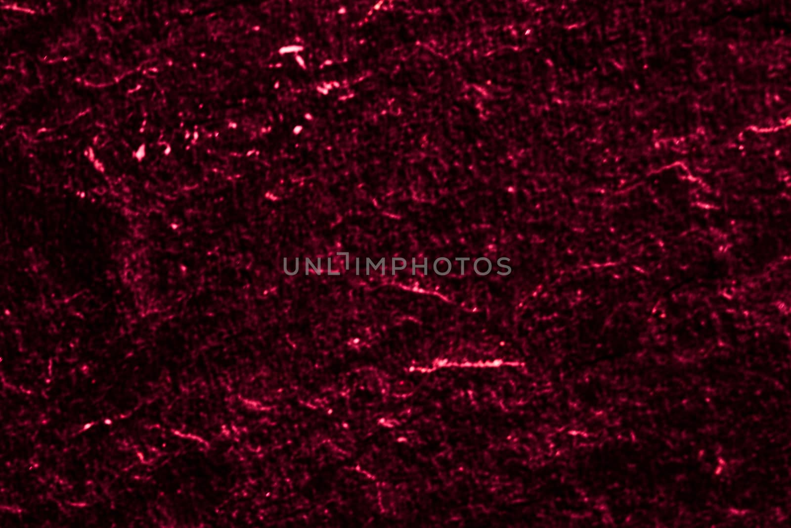 Red stone texture as abstract background, design material and textured surfaces