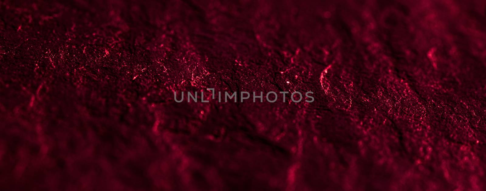 Red stone texture as abstract background, design material and te by Anneleven