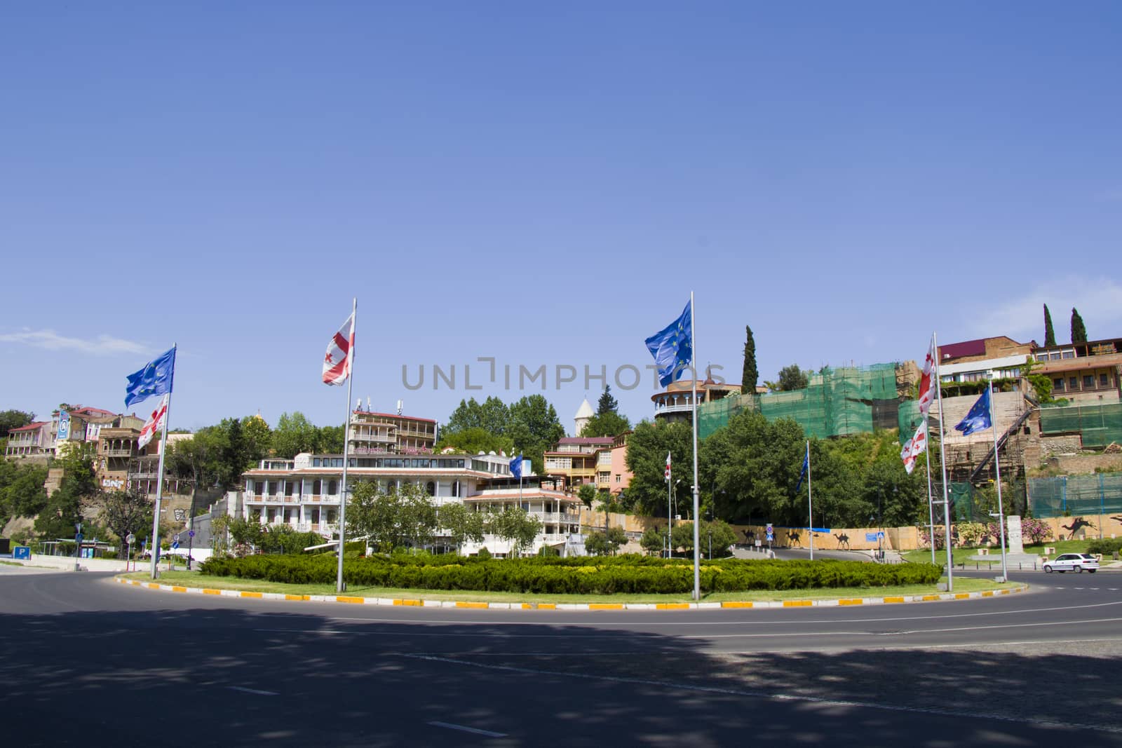 European square view, Georgian and european union flags, square in old town and city center of Tbilisi, Georgia