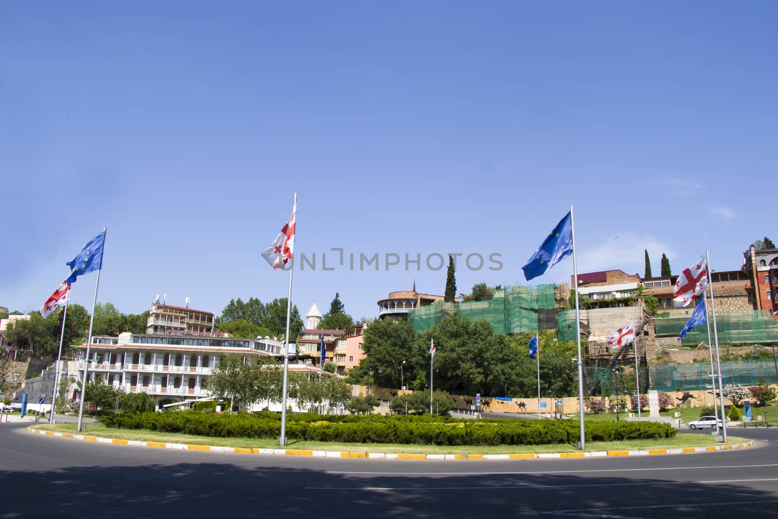 European square, Georgian and european union flags, square in old town and city center of Tbilisi, Georgia by Taidundua