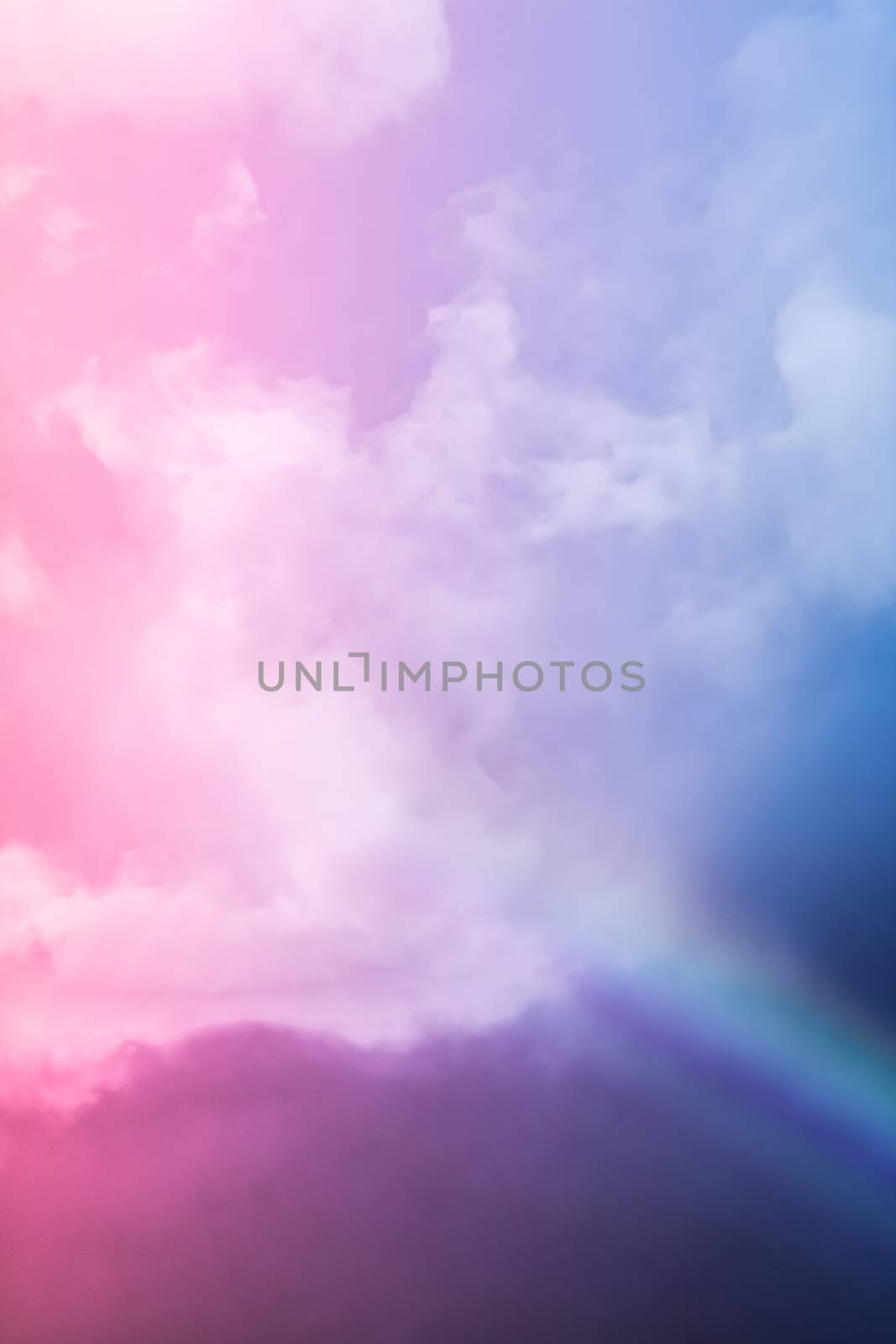 Rainbow in fantasy pink and blue sky, spiritual and nature backgrounds