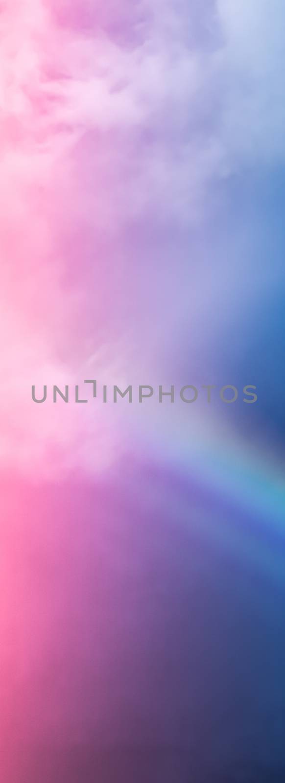 Rainbow in fantasy pink and blue sky, spiritual and nature backgrounds