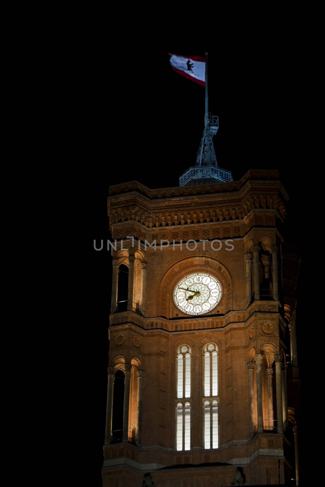 Famous landmark and architecture clock tower, red tower in Berlin, Germany
