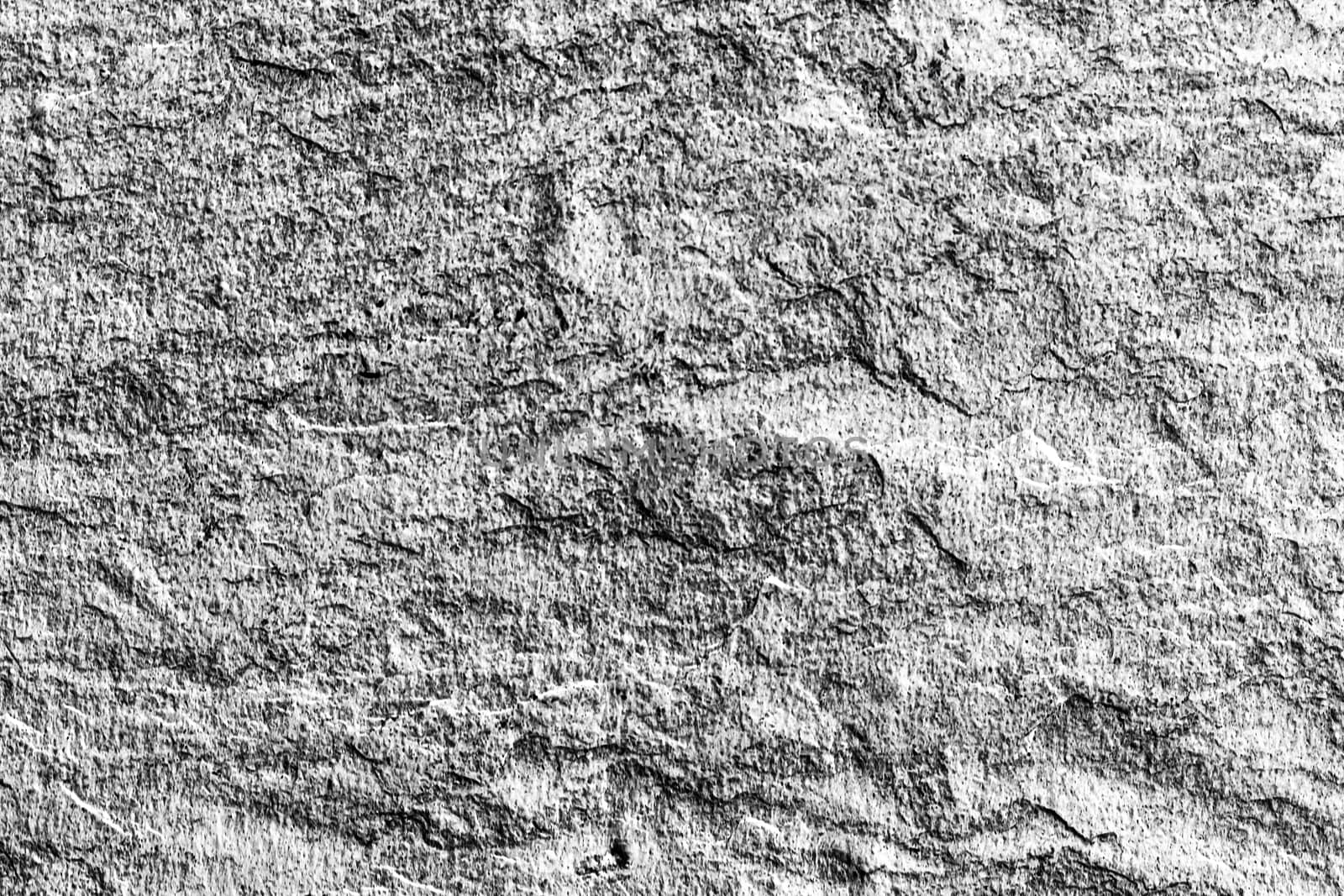 Light stone texture as abstract background, design material and textured surfaces