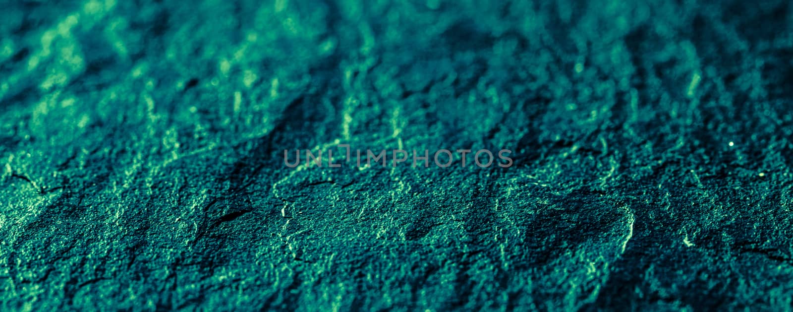 Emerald green stone texture as abstract background, design mater by Anneleven