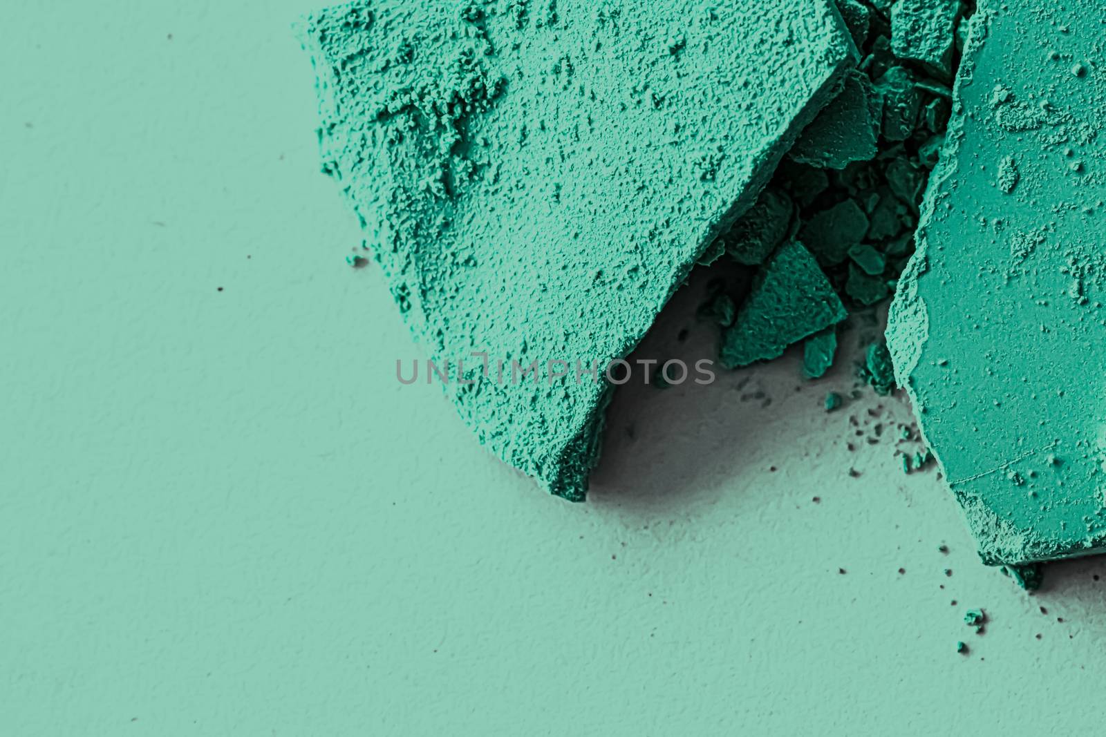 Mint eye shadow powder as makeup palette closeup, crushed cosmet by Anneleven