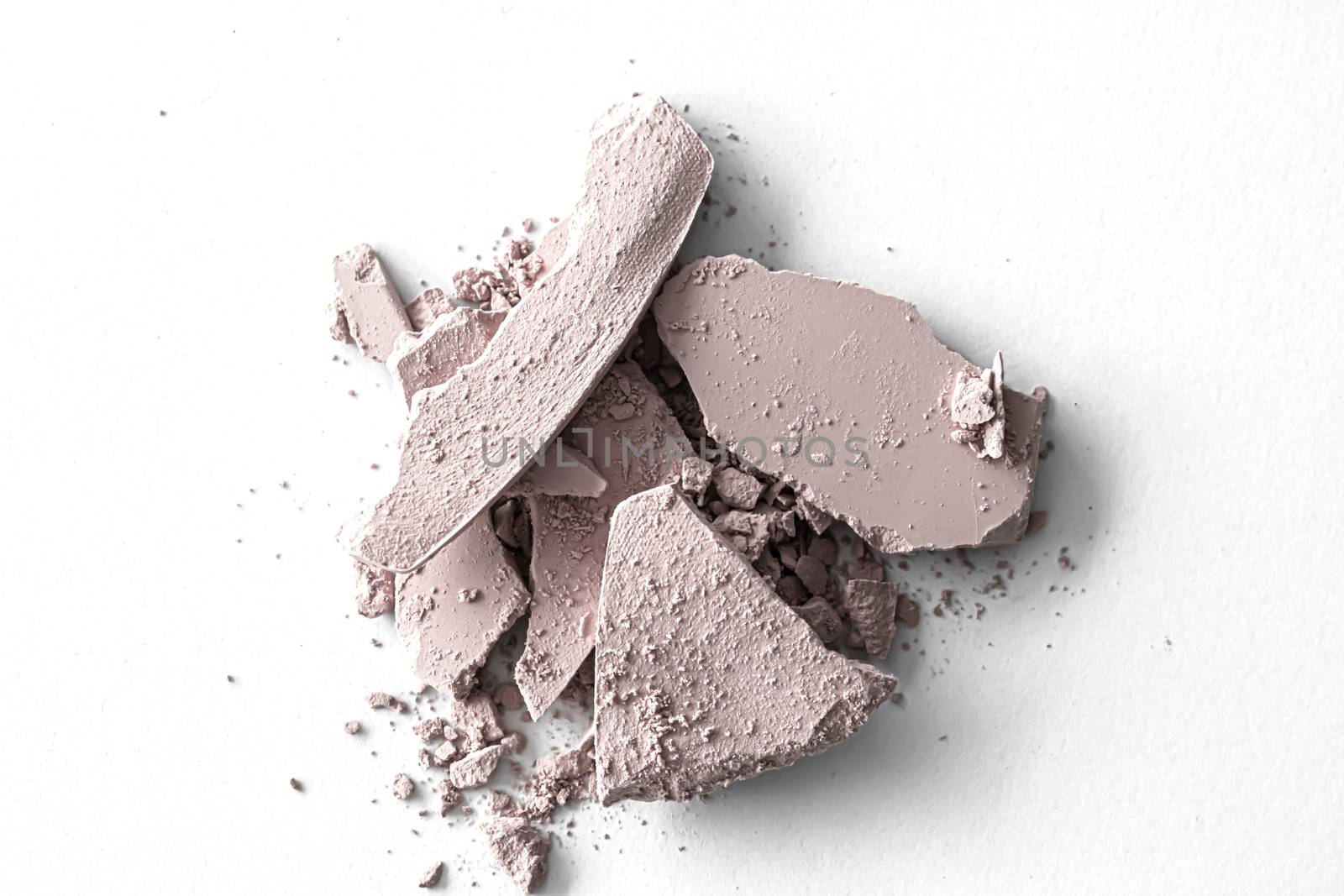 Pale eye shadow powder as makeup palette closeup isolated on whi by Anneleven