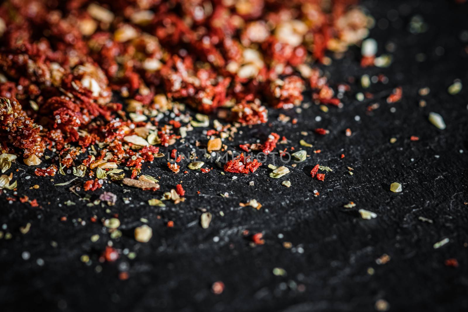 Dried tomato and chili pepper closeup on luxury stone background as flat lay, dry food spices and recipe ingredients