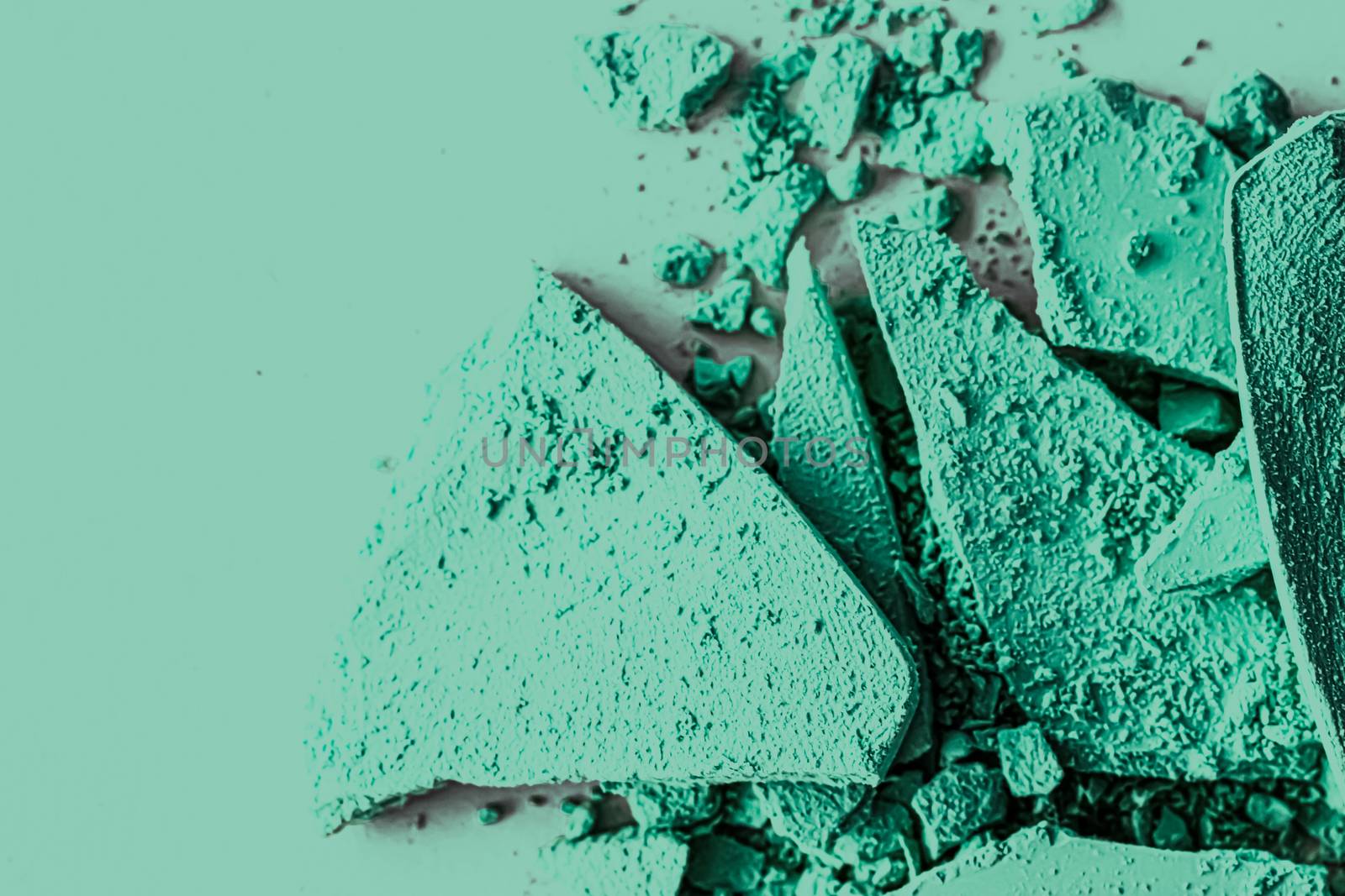 Mint eye shadow powder as makeup palette closeup, crushed cosmet by Anneleven