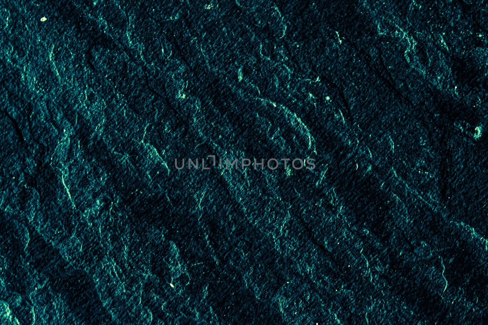 Emerald green stone texture as abstract background, design mater by Anneleven