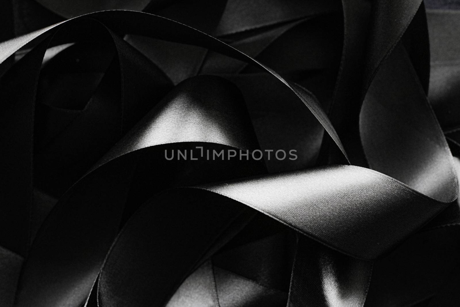 Black and white silk ribbon as background, abstract and luxury b by Anneleven