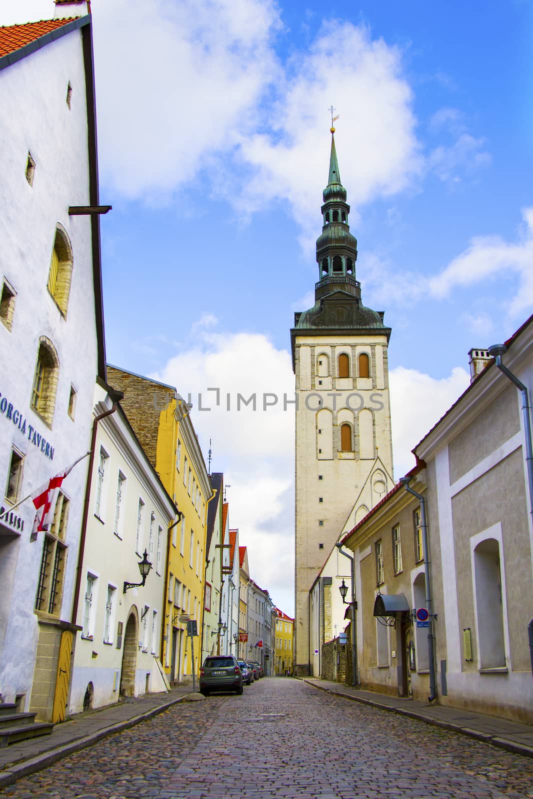 St. Nicholas' Church in Tallinn. The Estonian Evangelical Lutheral Church. Buildings and architecture exterior view in old town of Tallinn, colorful old style houses and street situation.