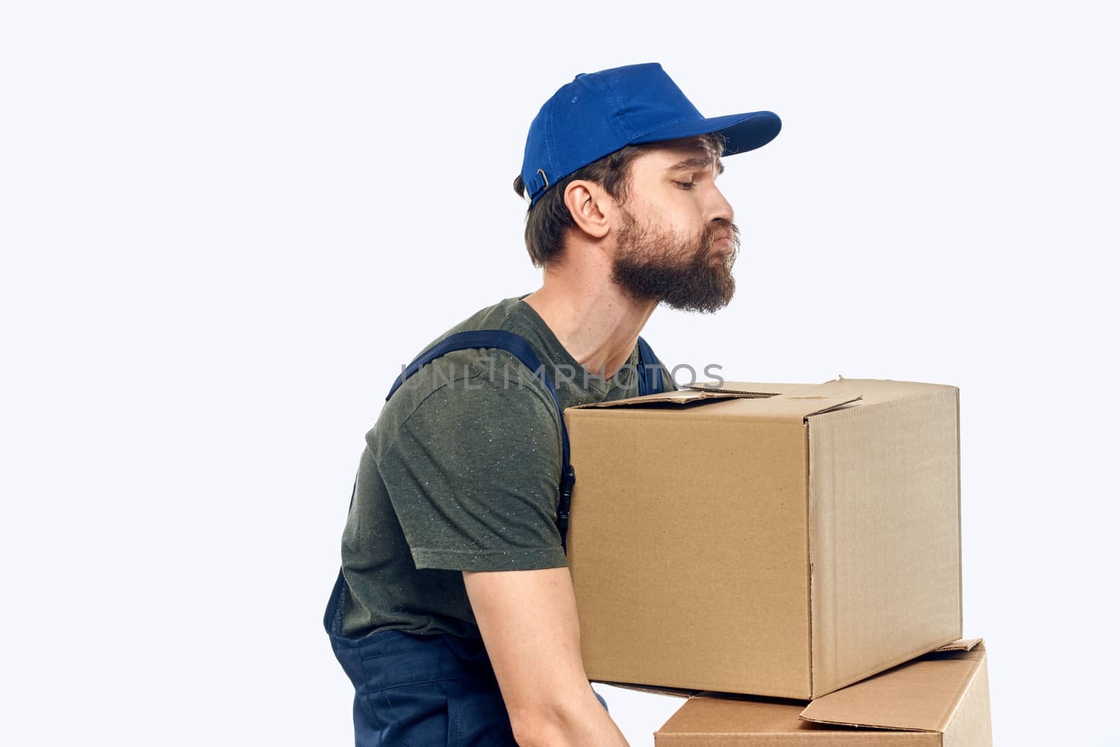 Working man with boxes in hands delivery service work lifestyle by SHOTPRIME