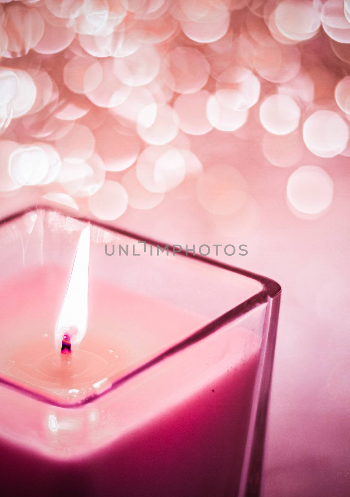 Festive decoration, branding and aromatherapy spa concept - Red aromatic candle on Christmas and New Years glitter background, Valentines Day luxury home decor and holiday season brand design