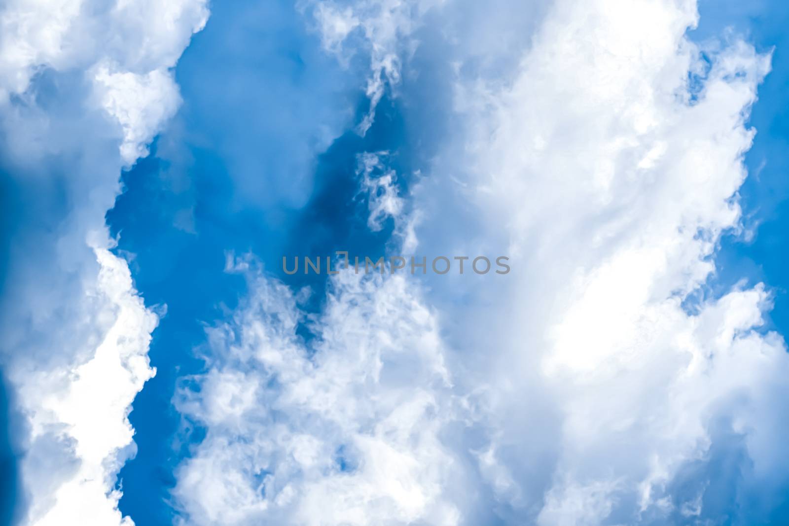 Dreamy blue sky and clouds, spiritual and nature background by Anneleven