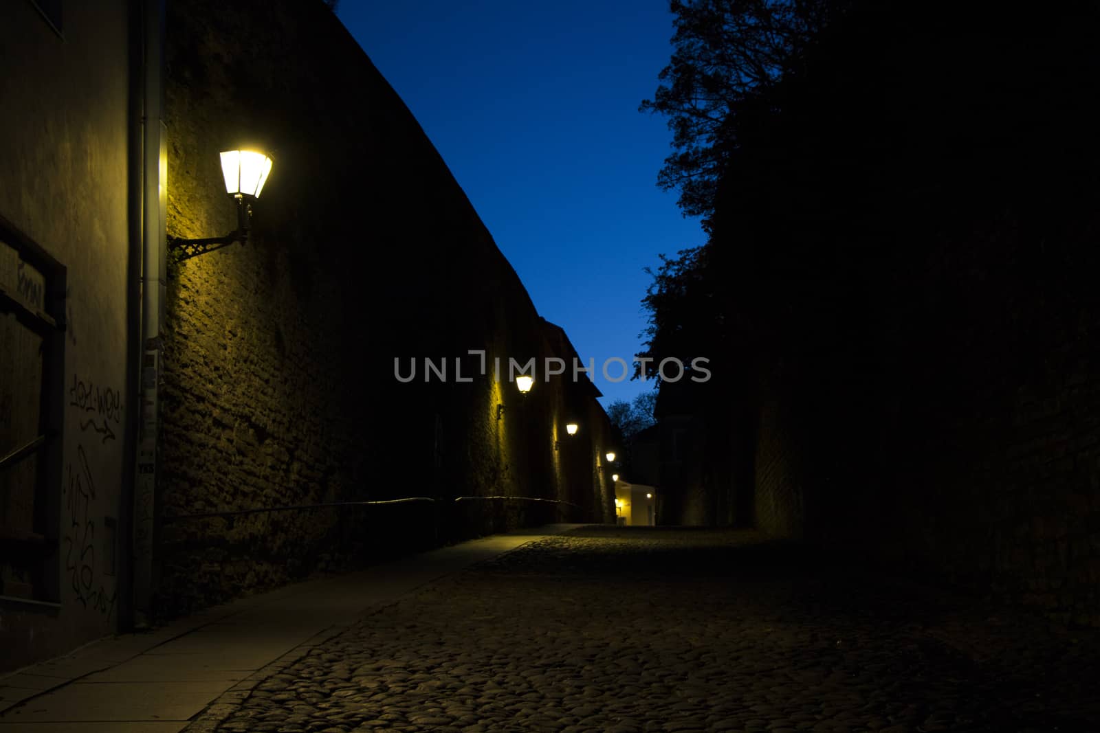night street situation, street light and stone road. by Taidundua