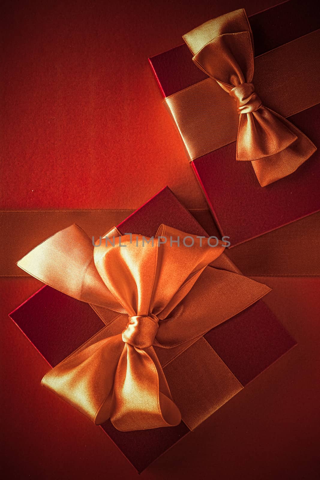 Luxury gifts with golden bow as holiday background, Valentines D by Anneleven