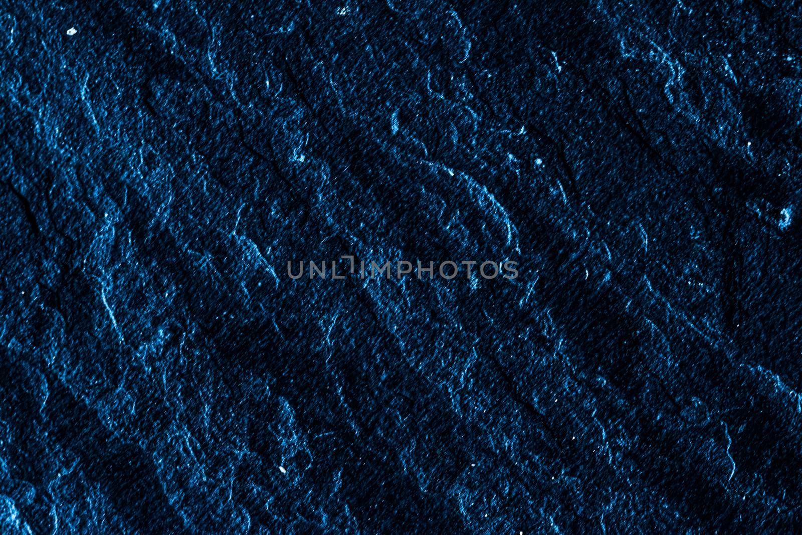 Blue stone texture as abstract background, design material and textured surfaces