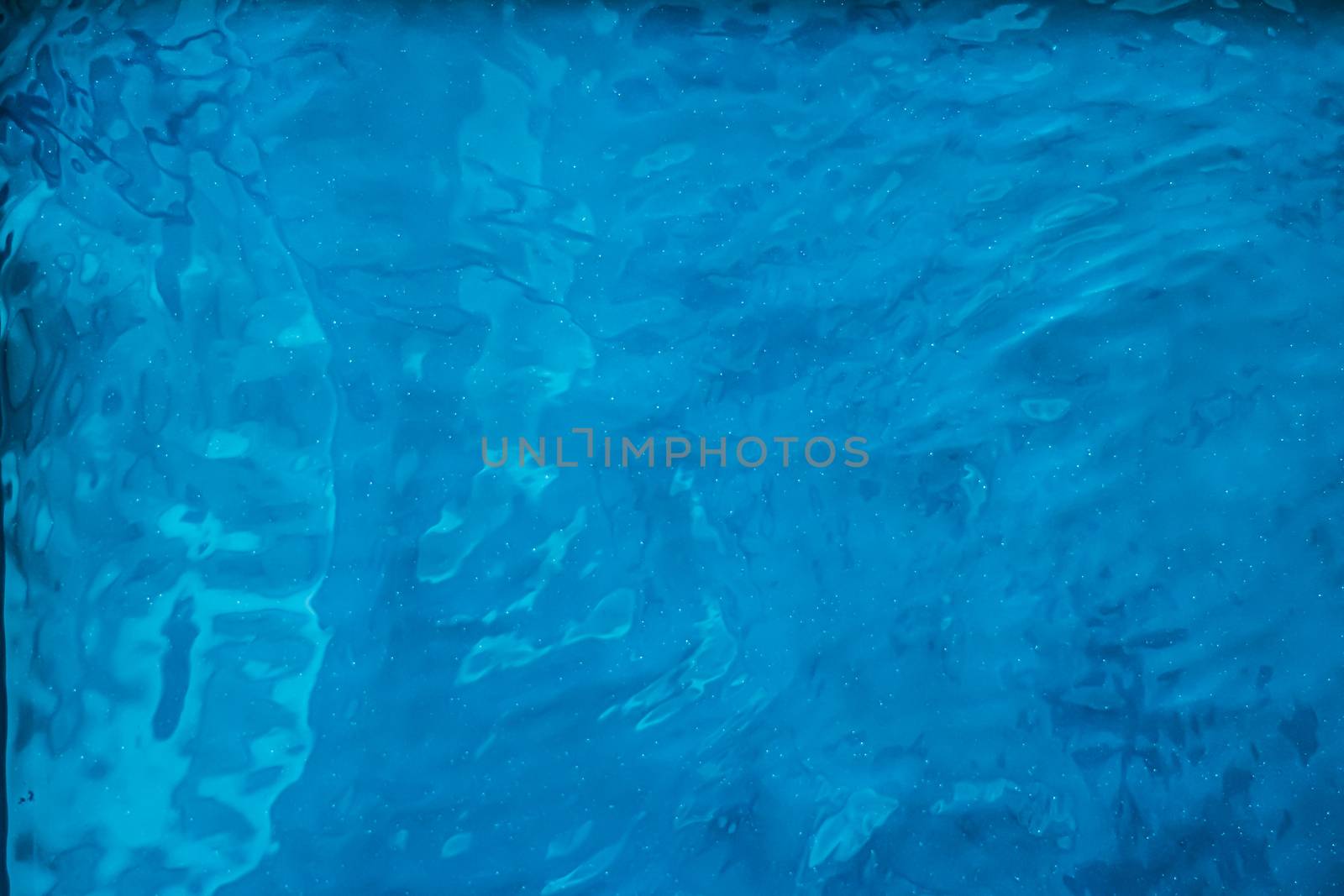 Blue water texture as abstract background, swimming pool and wav by Anneleven