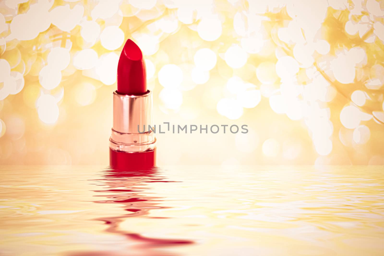 Red lipstick on golden background, make-up and cosmetics product