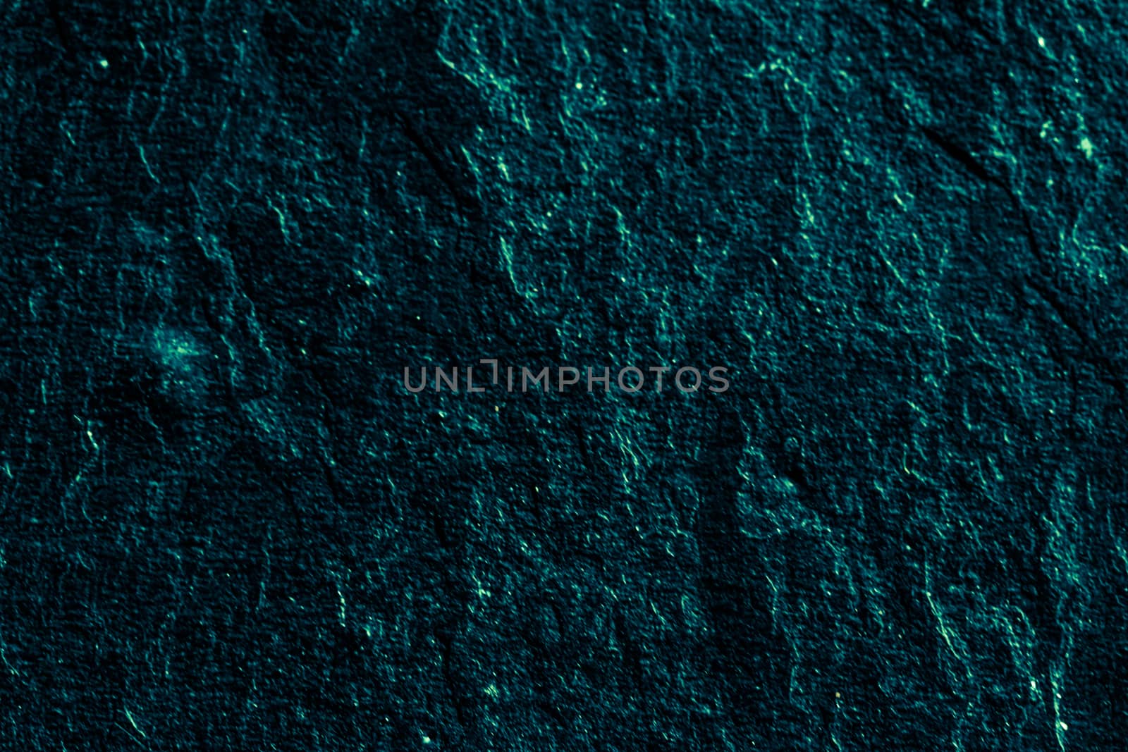 Emerald green stone texture as abstract background, design material and textured surfaces