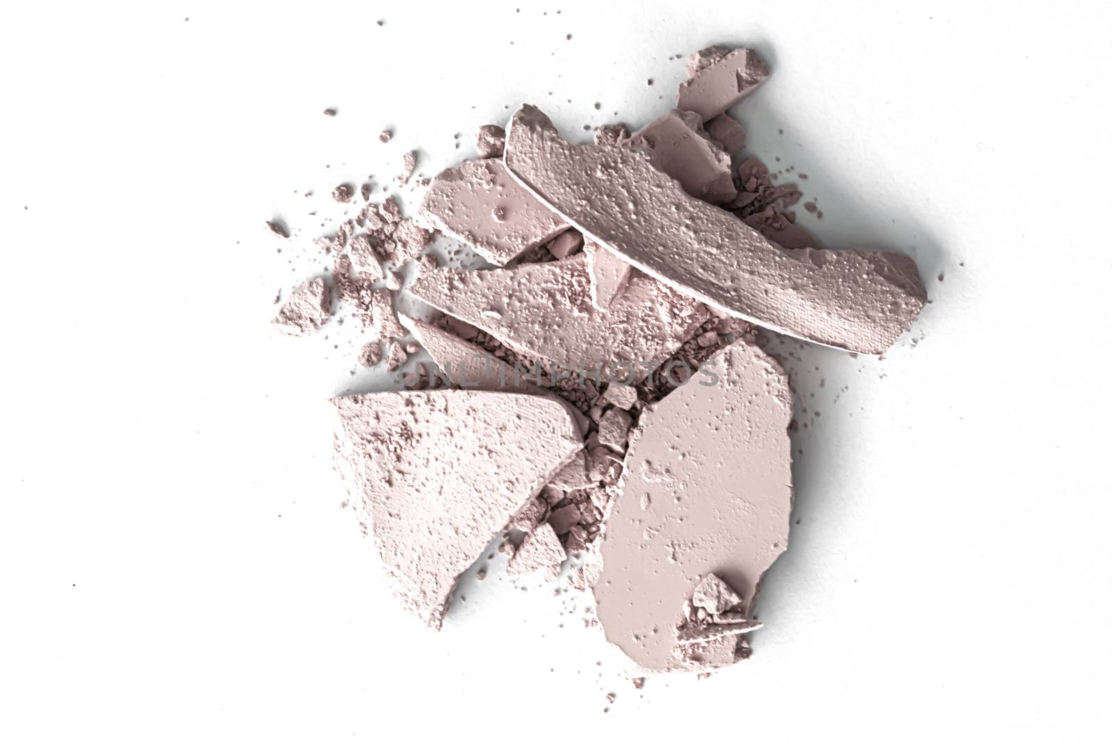 Pale eye shadow powder as makeup palette closeup isolated on white background, crushed cosmetics and beauty textures