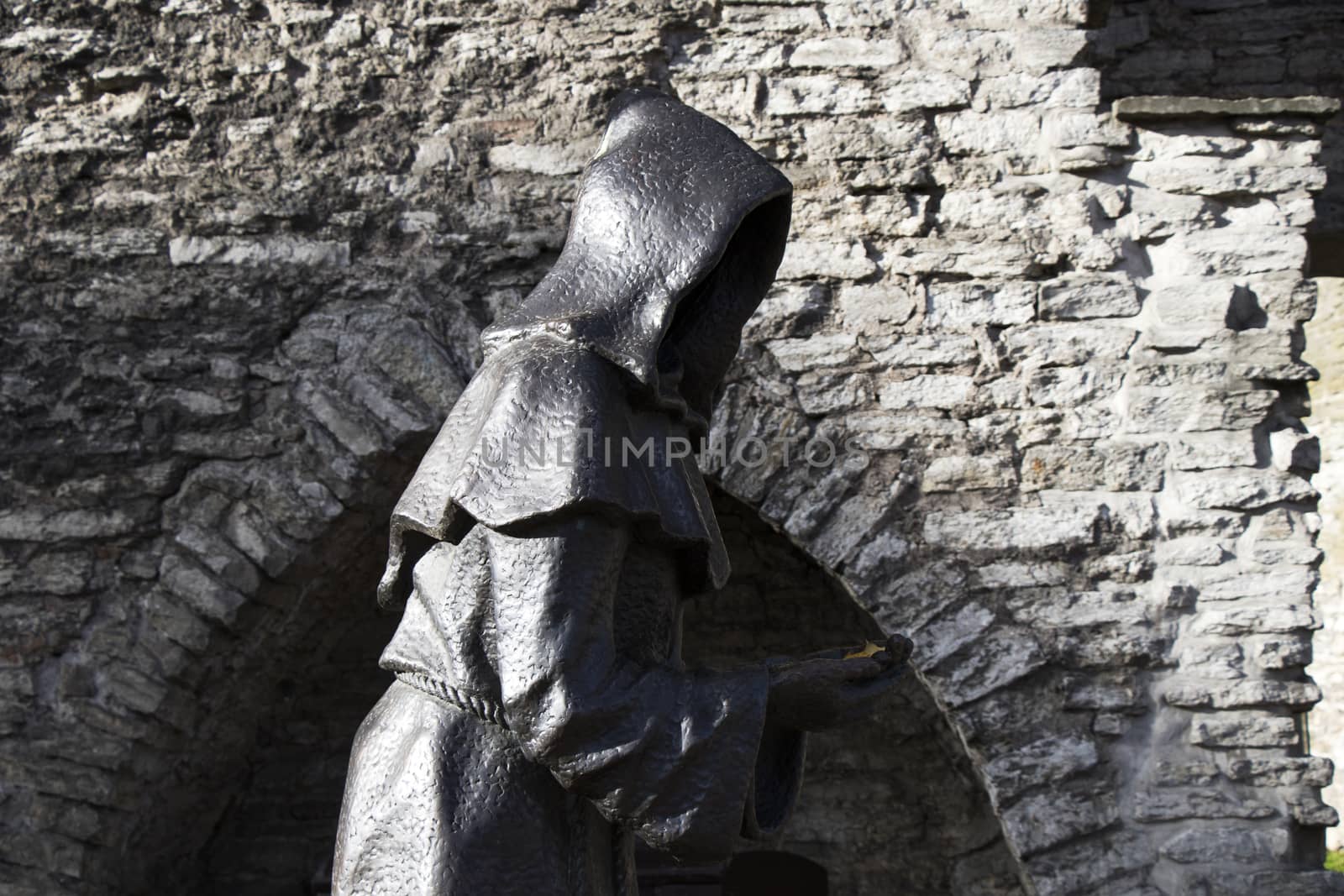 Sculpture and statue in Tallinn. The 3 monks of the Danish Garden. Estonia. by Taidundua