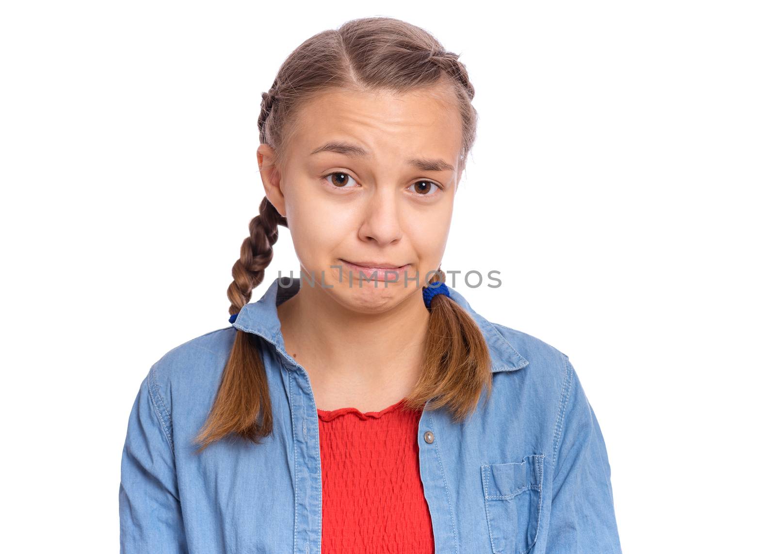 Emotional portrait of scared girl teenager, isolated on white background