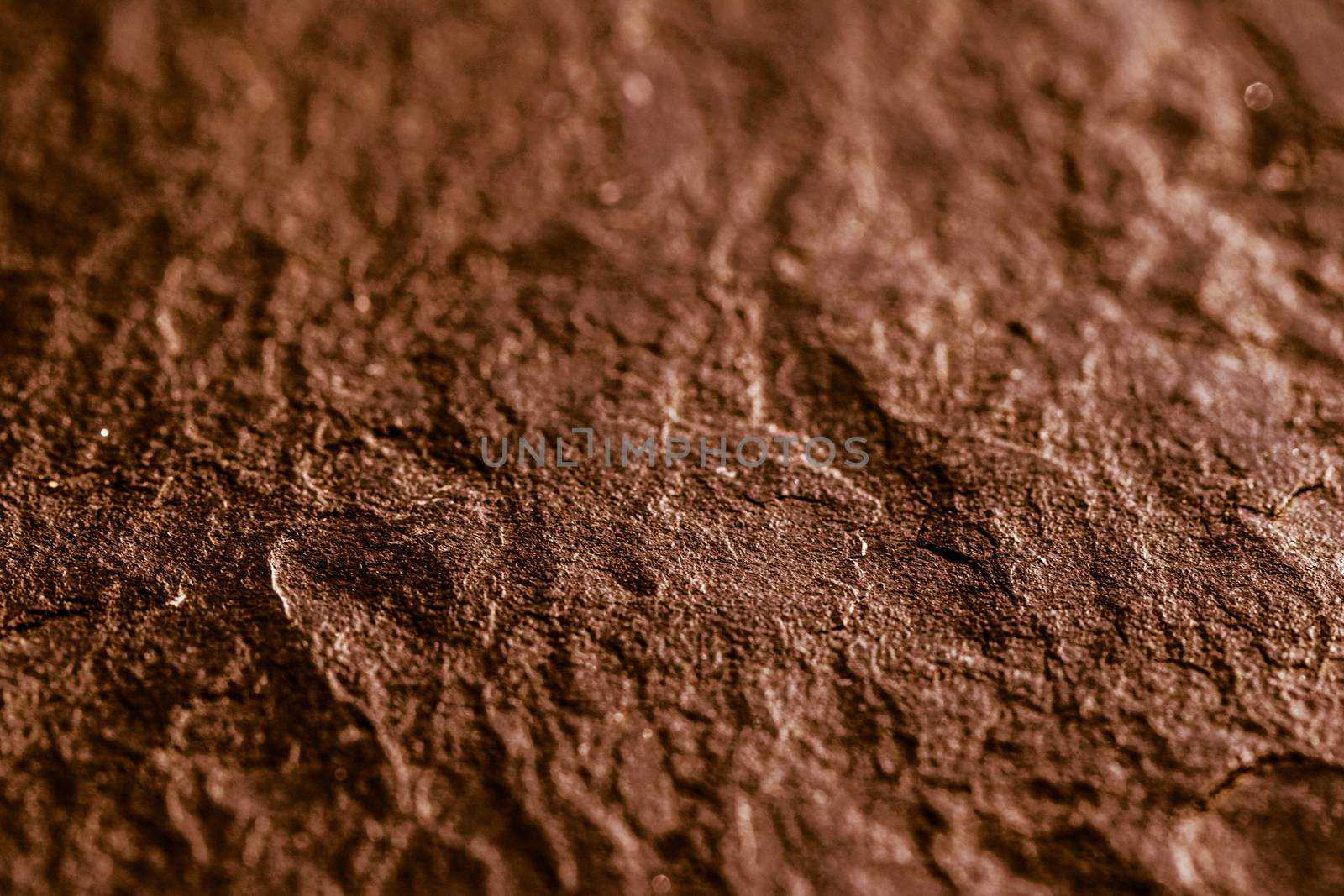 Brown stone texture as abstract background, design material and textured surfaces