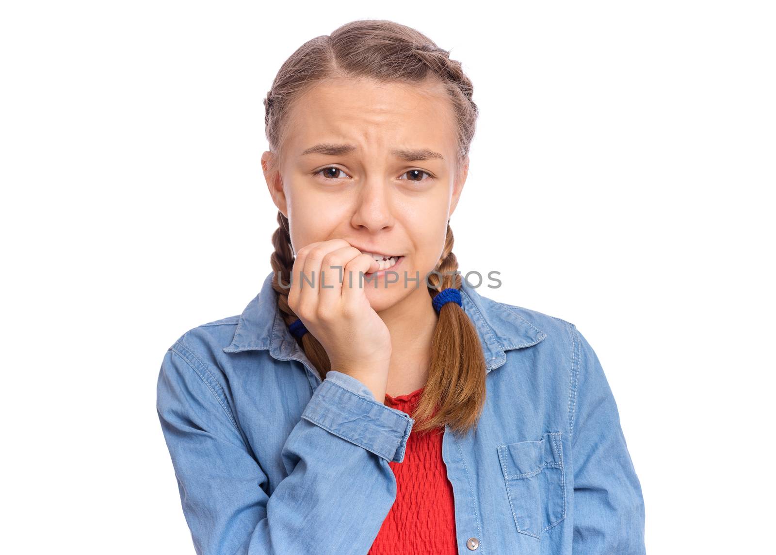 Emotional portrait of scared girl teenager, isolated on white background