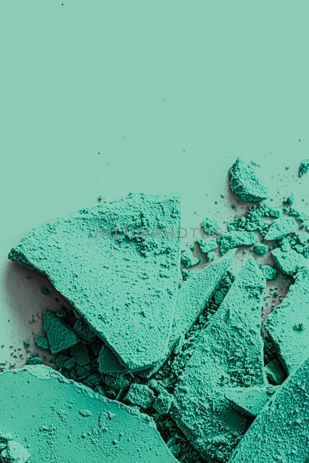 Mint eye shadow powder as makeup palette closeup, crushed cosmet by Anneleven