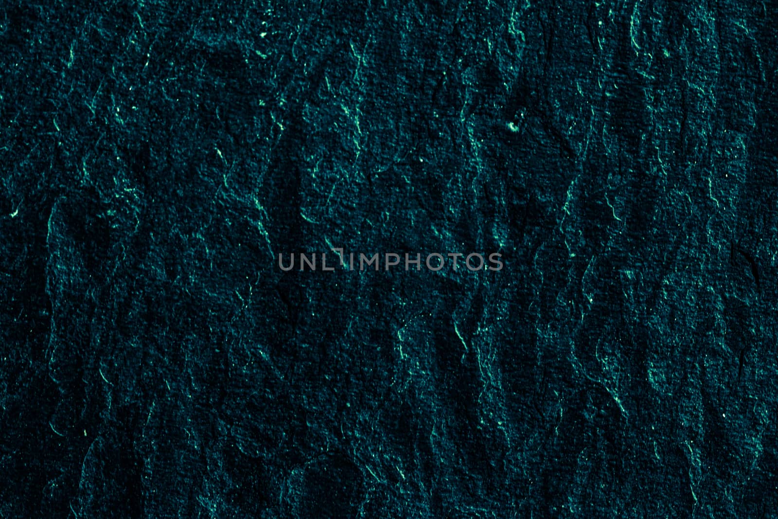 Emerald green stone texture as abstract background, design material and textured surfaces