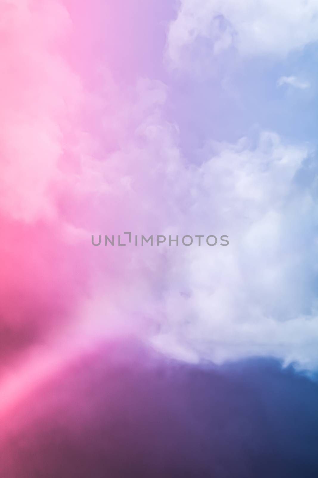 Rainbow in fantasy pink and blue sky, spiritual and nature backgrounds