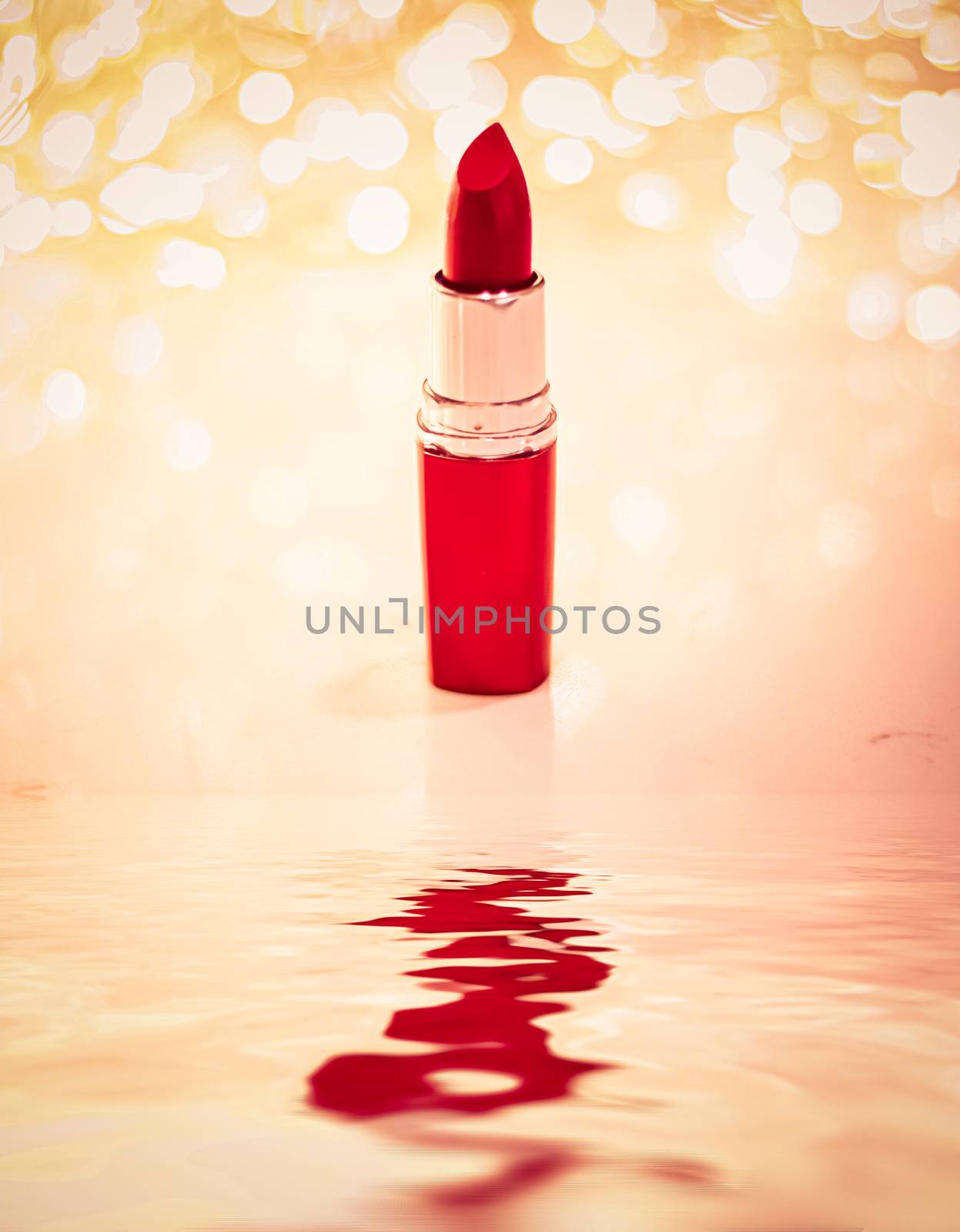 Red lipstick on golden background, make-up and cosmetics product