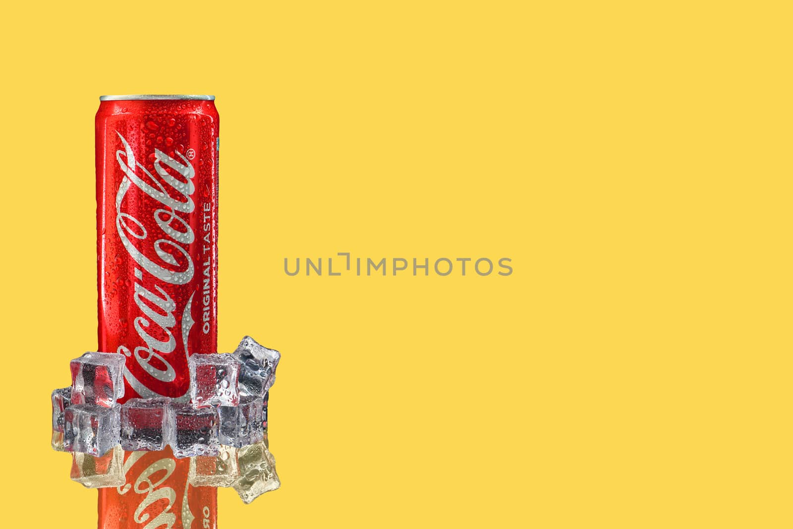 Kuala Lumpur, Malaysia - October 19, 2020 : Coca Cola or Coke Drink on yellow background