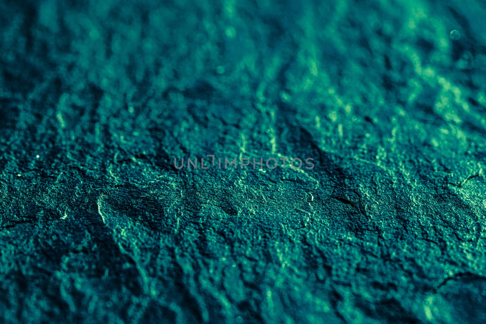 Emerald green stone texture as abstract background, design material and textured surfaces
