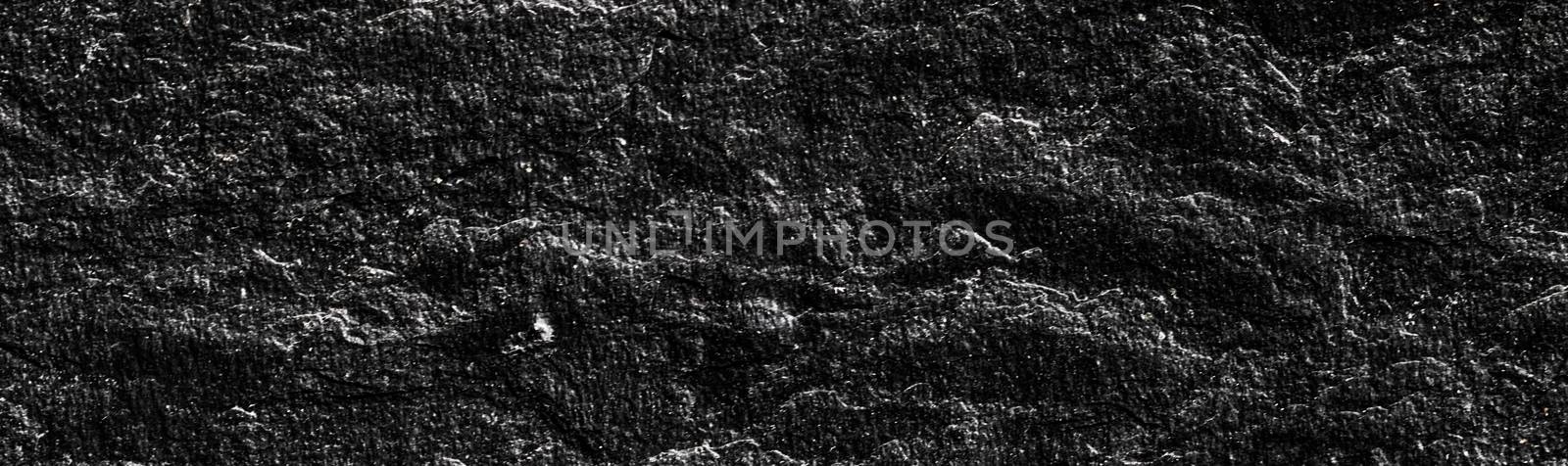 Black stone texture as abstract background, design material and by Anneleven