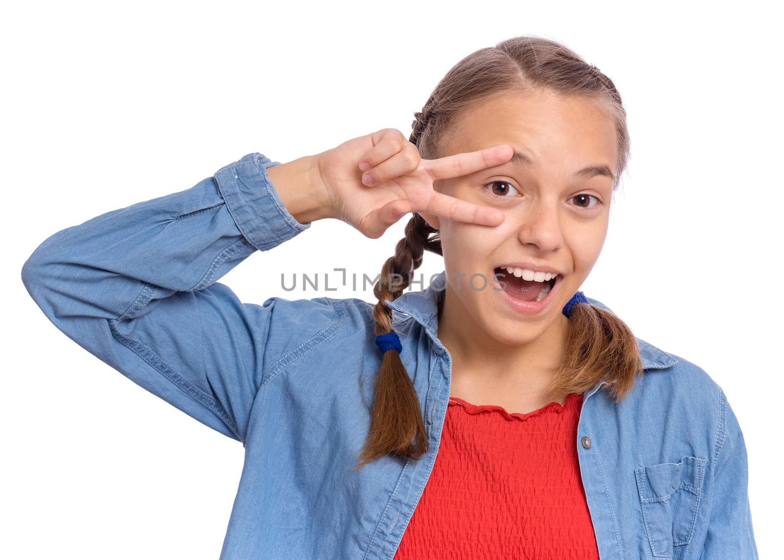 Happy teenage girl laughing looking very happy, isolated on white background