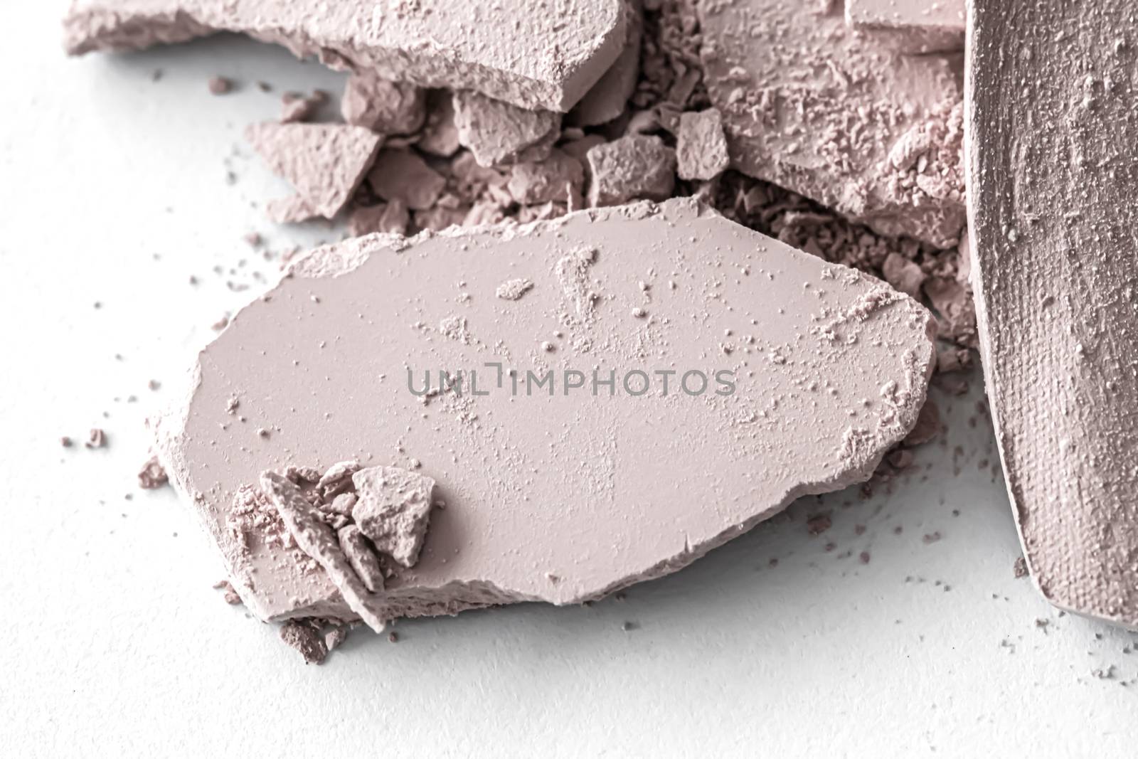 Pale eye shadow powder as makeup palette closeup isolated on whi by Anneleven