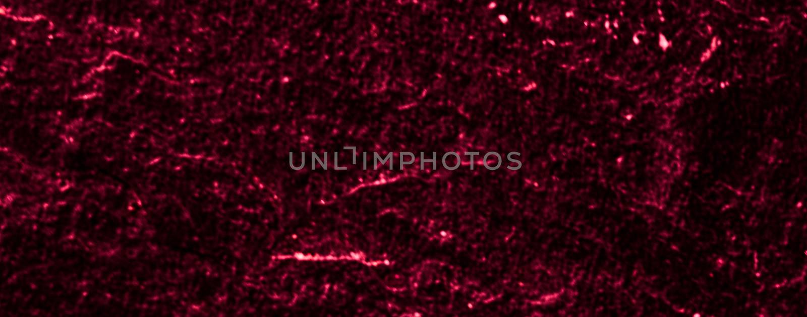 Red stone texture as abstract background, design material and textured surfaces