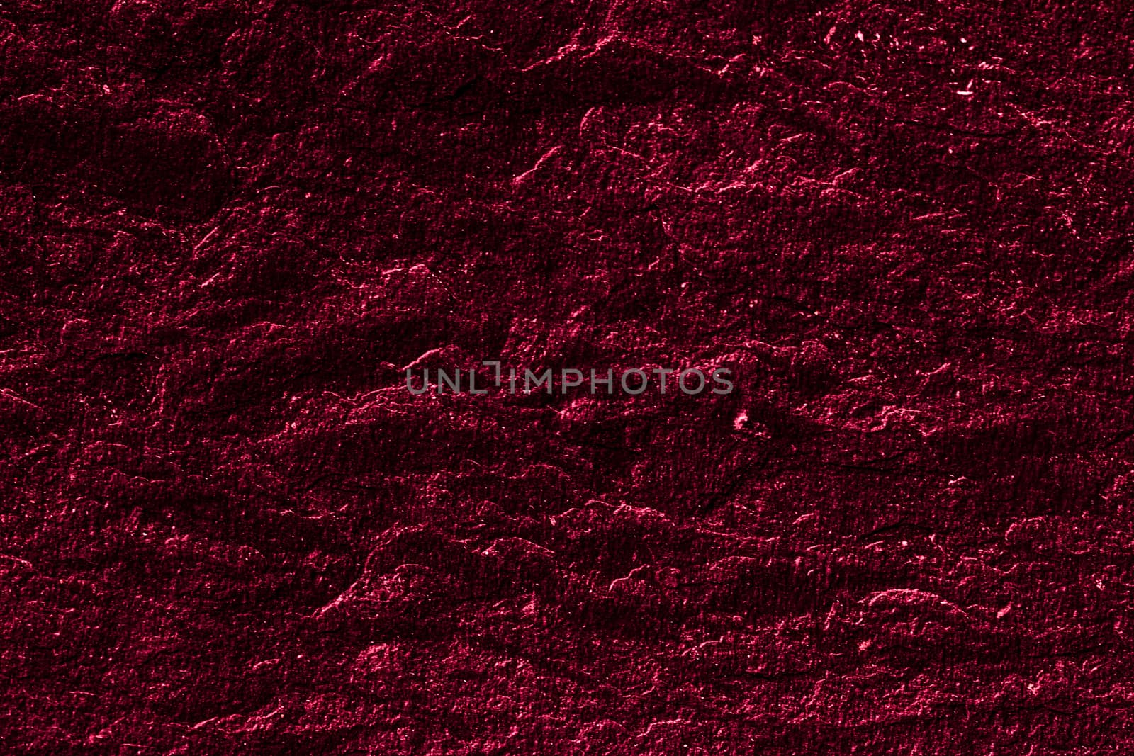 Red stone texture as abstract background, design material and textured surfaces